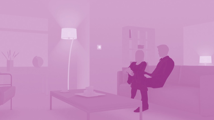 Visualisering av ett par som sitter på soffan hemma och  njuter av LED-belysning